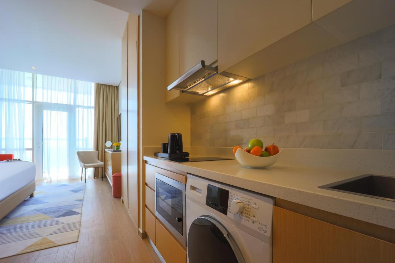 Adagio Jumeirah Village Triangle Dubai Exterior foto