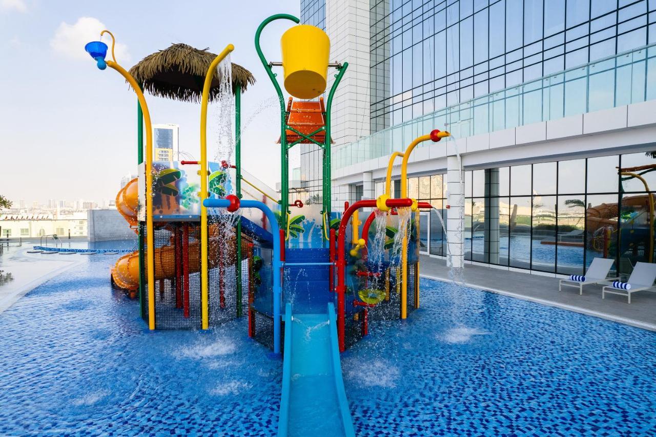 Adagio Jumeirah Village Triangle Dubai Exterior foto