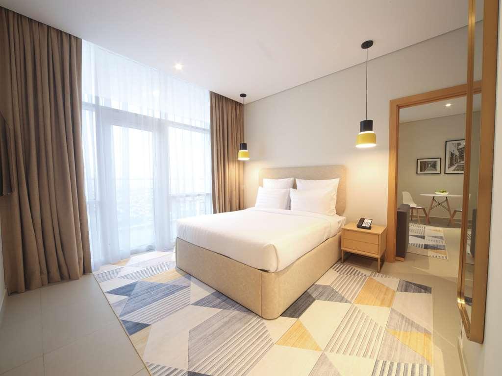 Adagio Jumeirah Village Triangle Dubai Quarto foto